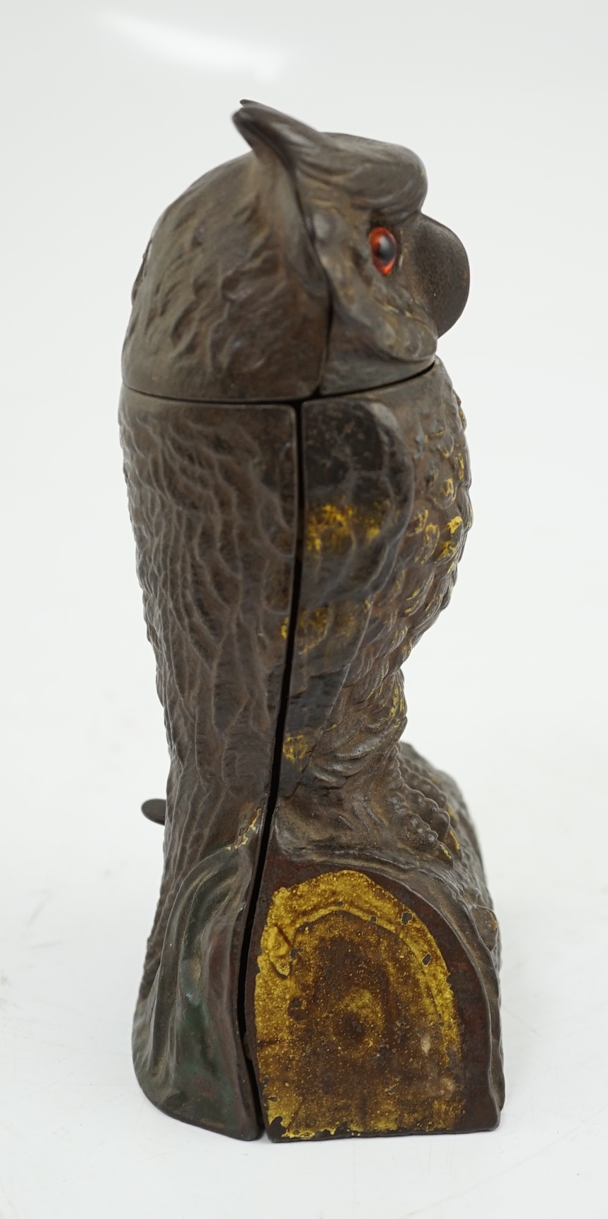 A late 19th century American cast iron owl Patent money box